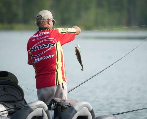 <p>
	Martin pulls in a small bass. </p>
