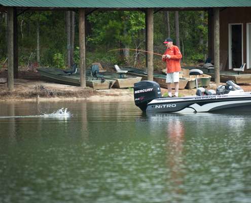 <p>
	Jerry McKinnis hooks a fish. </p>
