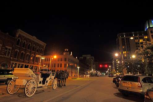 <p>
	 </p>
<p>
	A nighttime view of Commerce Street in downtown Montgomery looking up from the Riverfront. Capital City Carriage provides horse-drawn rides through downtown. </p>
