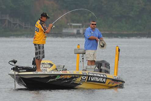<p> 	Terry Scroggins hooks one as soon as he gets to his first stop of the day.</p> 