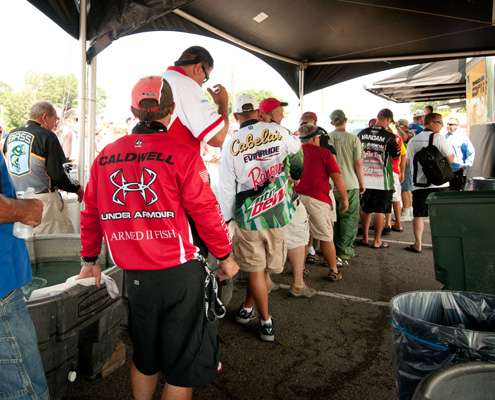 <p>
	 </p>
<p>
	Anglers wait in line for their turn on stage with Chris Bowes.</p>
