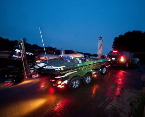 <p>
	Bernie Schultz backs his boat off the ramp into the water.</p>
