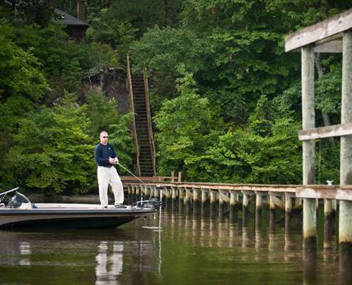 Kiefer fishing along side a private dock.