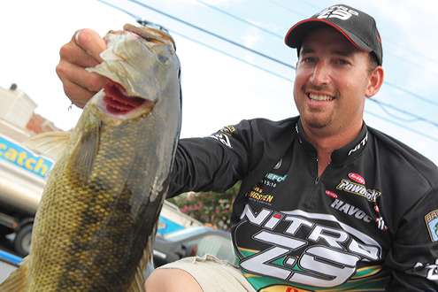 <p>
	Ott DeFoe shows off his catch.</p>
