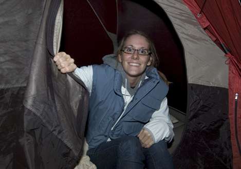 <p>
	Valerie ducks into her heated tent to escape a cold night.</p>
