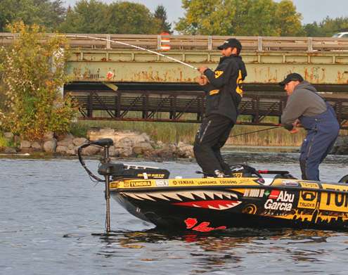 <p>
	As his co-angler goes for the net, Mike Iaconelli leans back and wrestles the fish towards the boat.</p>
