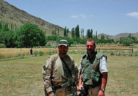 <p>
	 </p>
<p>
	This is what he looked like when he got there. That's Dr. Mac on the right ... we can't say anything about the guy standing next to him.</p>
