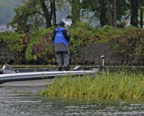 <p>
	Tournament leader Ish Monroe starts his day fishing around some grass on Oneida Lake.</p>
