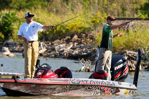 <p>
	Brady Winnins and Jason Bloxom were fishing wood cover along the main river channel. </p>
