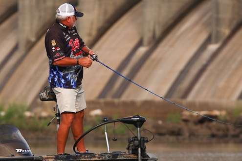 <p>
	 </p>
<p>
	Biffle sweeps his rod as it bends from the weight of another fish. </p>
