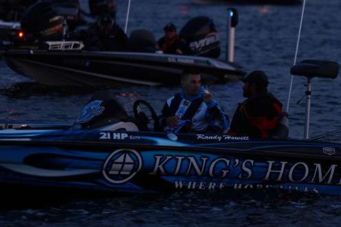 <p>
	Randy Howell discusses the Day Two gameplan with his co-angler.</p>
