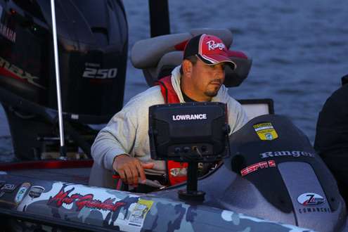 <p>
	Elite Series angler Matt Greenblatt idles through the morning boat check.</p>
