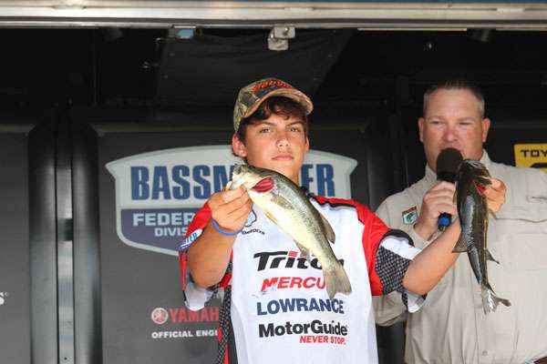 <p>
	West Virginia youth winner in the 11-14-year-old age group Zachery Horrocks displays his winning fish.</p>
