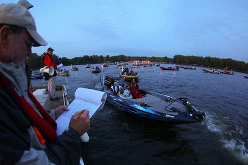 <p>
	Randy Howell idles past the morning boat inspection.</p>
