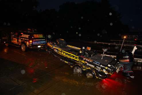 <p>
	Mike Iaconelli launches his boat as a light rain begins to fall. </p>
