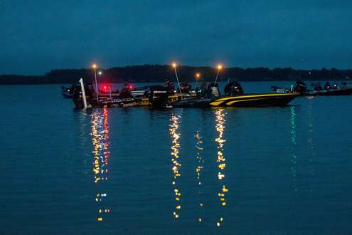 <p> 	Running lights reflect across the water on the final day of the Bass Pro Shops Northern Open #3.</p> 