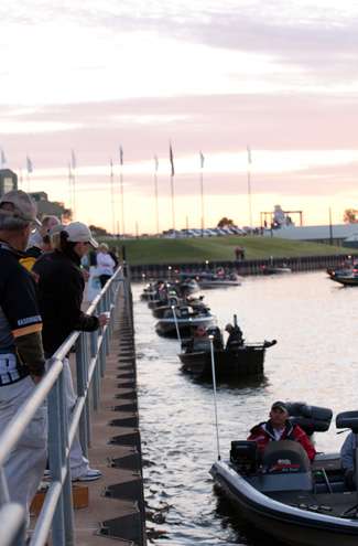<p>
	Fans line the rail as anglers wait to start Central Open #2 on the Arkansas River. </p>
