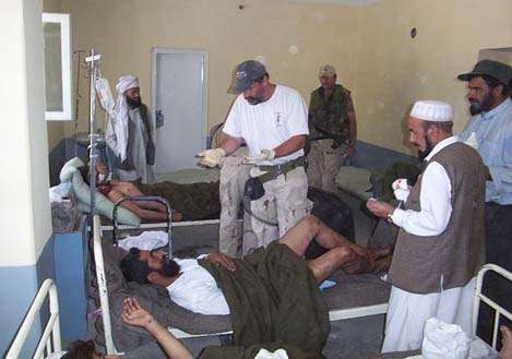 <p>
	 </p>
<p>
	Mac in a hospital he and his guys set up in town for the people of Afghanistan. "People are people are people."</p>
