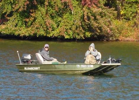 <p>
Auburnâs Jacob Fine and Brianna from Hooters come in after a cool day of fishing. Hooters donated all of the food for the event.</p>