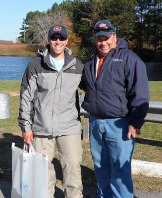<p>
	Daryl High, assistant advisor for Auburn, and Bob pose for a photo after they weighed their fish. </p>

