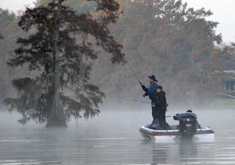 <p>
</p>
<p>
Matt Cipriano (left) and Mark Morrison cast to cypress trees and docks.</p>