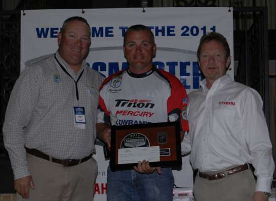 <p>
	Josh Polfer, center, is the second Idaho angler in a row to win the Western Division. Jon Stewart, left, and Dave Ittner, right, presented him with his invitation to the 2012 Bassmaster Classic.</p>
