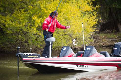 <p>
	Todd Serfoss lands a fish in the boat. </p>

