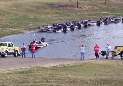 <p>
	Boats wait on the bank for their number to be called at the ramp.</p>
