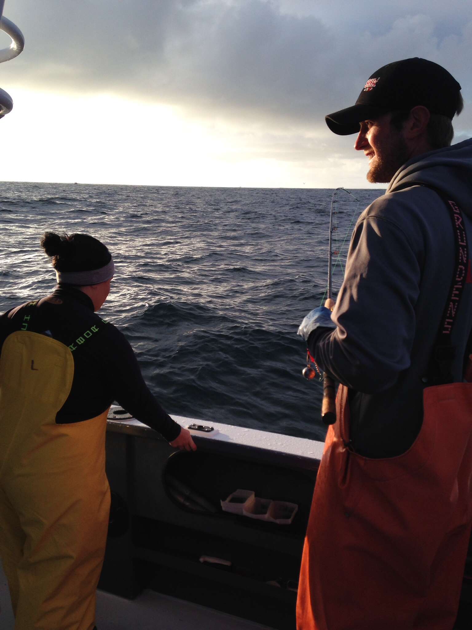 Elizabeth Erickson getting ready to tackle some silver salmon with help from first mate Kyle.