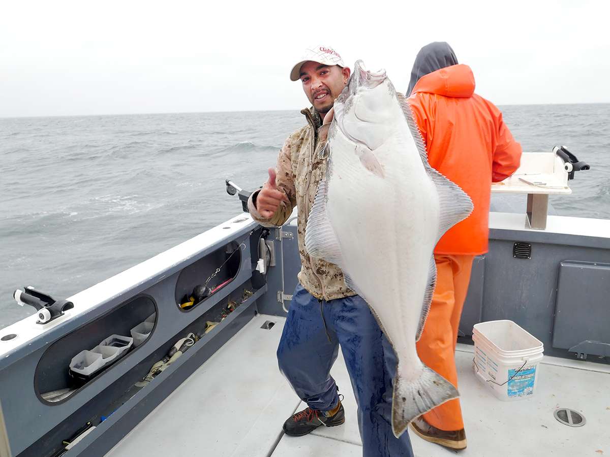 Chris Pascua holding up a nice halibut. 