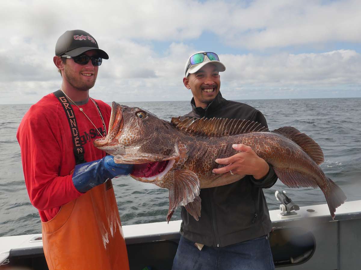 Chris Pascua and firstmate Kyle holding up a nice Ling cod. The ling cod was lucky enough to fight another day and was released after this image.