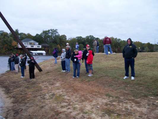 <p>
	Spectators lined the bank to watch the Launch festivities.</p>

