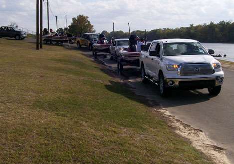 <p>
	The boats are pulled single file back to the boat yard.</p>
