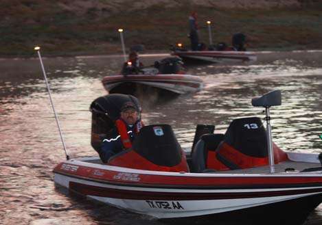 <p>
	The boats line up single file to idle past the dock for safety checks prior to take-off.</p>
