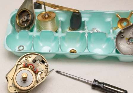 To simplify the reassembly, place the reel's parts into an egg carton in the order they are removed.