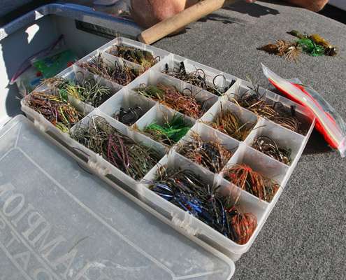 <p>
	McClelland carries a box full of Jewel jigs, with more stored in Hefty bags for easy access. He often plays careful attention when fishing, to see what color a crawdad might be when he notices one sticking out of the mouth of a bass. Also, donât get caught without enough of the hot color for that day. Break off your last one and you will be wishing you had stocked up like McClelland.</p>
