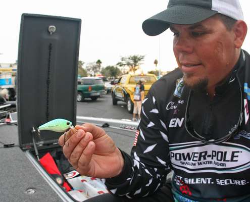 <p>
	This Luck âEâ Strike RC2 crankbait also helped Lane search for bass quickly. When he got a few bites in an area, he would slow down and fish the Gambler Sweebo worm to pick up the less active bass.</p>
