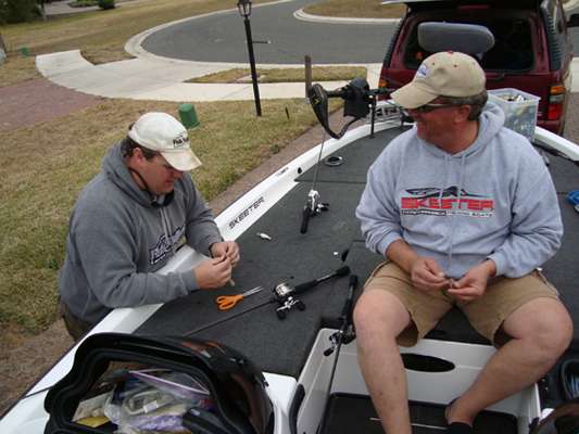 <p>
	Jarrod Nelson and Jeff Stone prepare tackle and share fish stories the day before the Harris tournament.</p>

