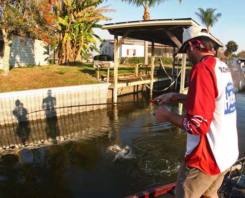 <p>
	The bass explodes out of the water as Charlie Machek patiently plays it to the boat on light line.</p>
