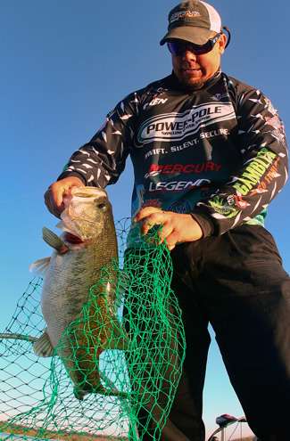 <p>
	Lane pulls out a beautiful largemouth that he caught on Day Three.</p>
