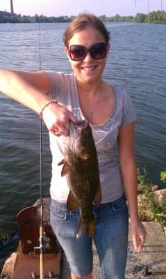 <p>
	Casey holds up her smallmouth with pride!</p>

