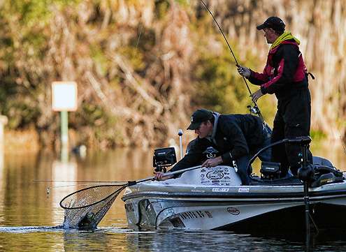 <p>
	Ryan LaTine and Russ Nixon work together to put a quality fish into the boat. </p>
