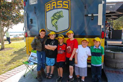 <p>
	 </p>
<p>
	These youngsters pitched in during the weigh-in, carrying bass down to the release boat.</p>
