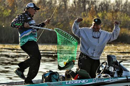 <p>
	With the big largemouth safely in the boat, Lane lets out a shout as his non-boater celebrates with him.</p>
