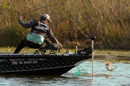 <p>
	Another bass goes airborne as Chris Lane fights it to the boat.</p>
