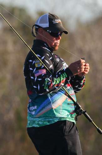 <p>
	Lane stops to re-rig his bait on Day Three of the Bass Pro Shops Bassmaster Southern Open on the Harris Chain.</p>
