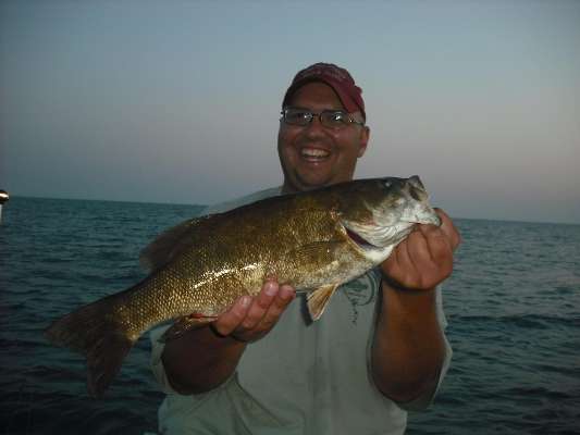 <p>
	Jason Luna wears a smile as he shows off this fish, which he calls a âLake St. Clair beast.â He was fishing a Strike King Red Eye Shad in sexy lavender shad.</p>
