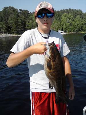 <p>
	Jess Higgins caught this 4-pounder in Ely, Minn., in August 2011. It was 22 inches long and he caught it on a chartreuse Berkley Gulp Alive 4-inch minnow.</p>
