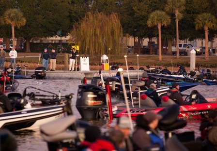 <p>
	Tournament Director Chris Bowes helps anglers get their place in line. </p>
