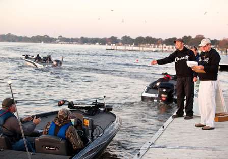 <p>
	B.A.S.S. officials throw lanyards to each boat. </p>
